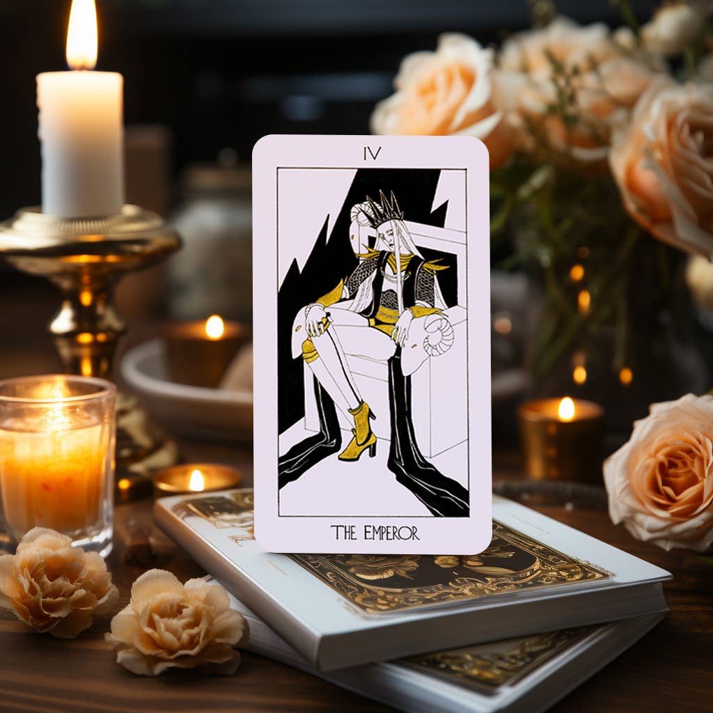 The Golden Path Tarot card The Emperor displayed with candles