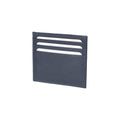 Blue leather card holder standing angled showing six empty card slots