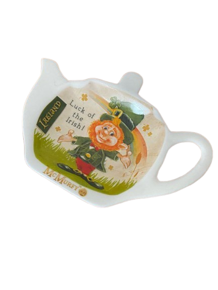 Teapot-shaped ceramic dish featuring an illustration of McMurfy the leprechaun and "Luck of the Irish" text