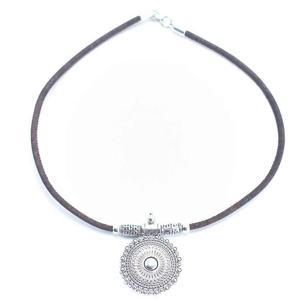 Meninas Bonitas Cork Handmade Cork Necklace 42cm – detail – front view of the brown cork necklace with a round silver-tone pendant.