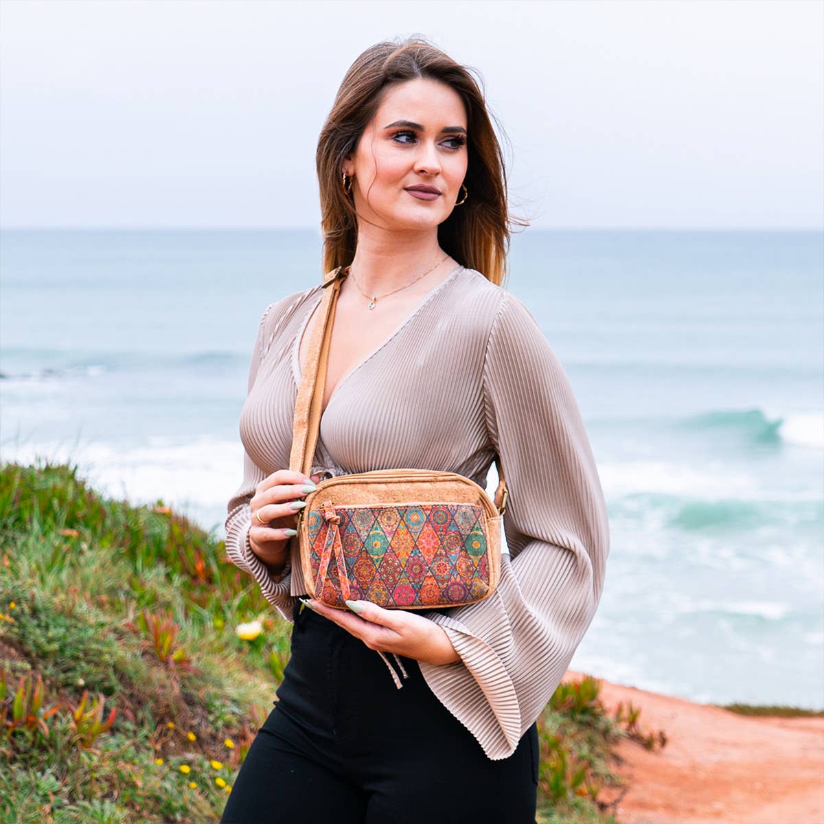 Meninas Bonitas Cork Patchwork Crossbody Bag 21x15x8cm – lifestyle – model wearing the bag crossbody to show its size and carry position.