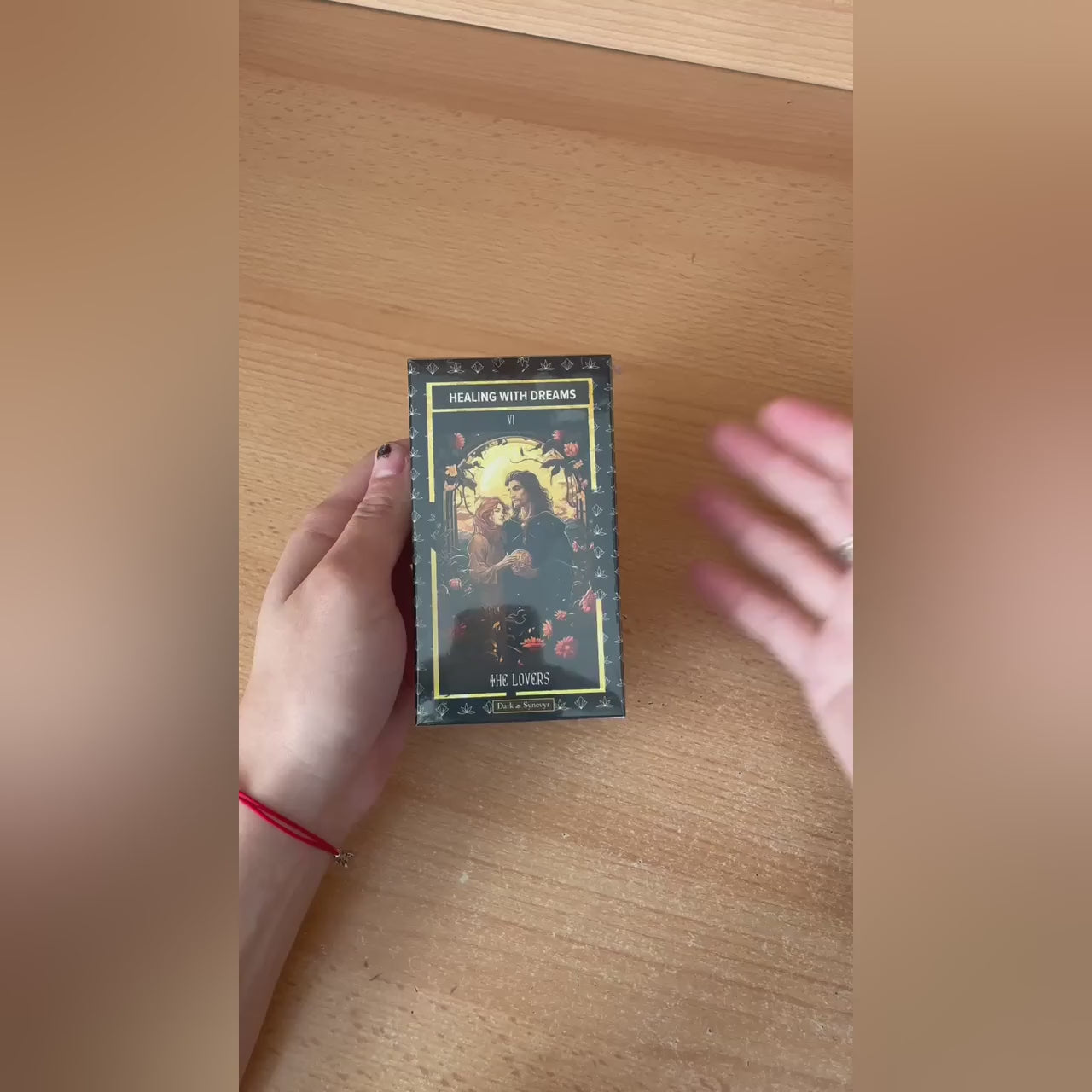 Dark Synevyr Healing with Dreams Tarot Deck 80 Cards – a video showing the tarot deck and cards in hands.
