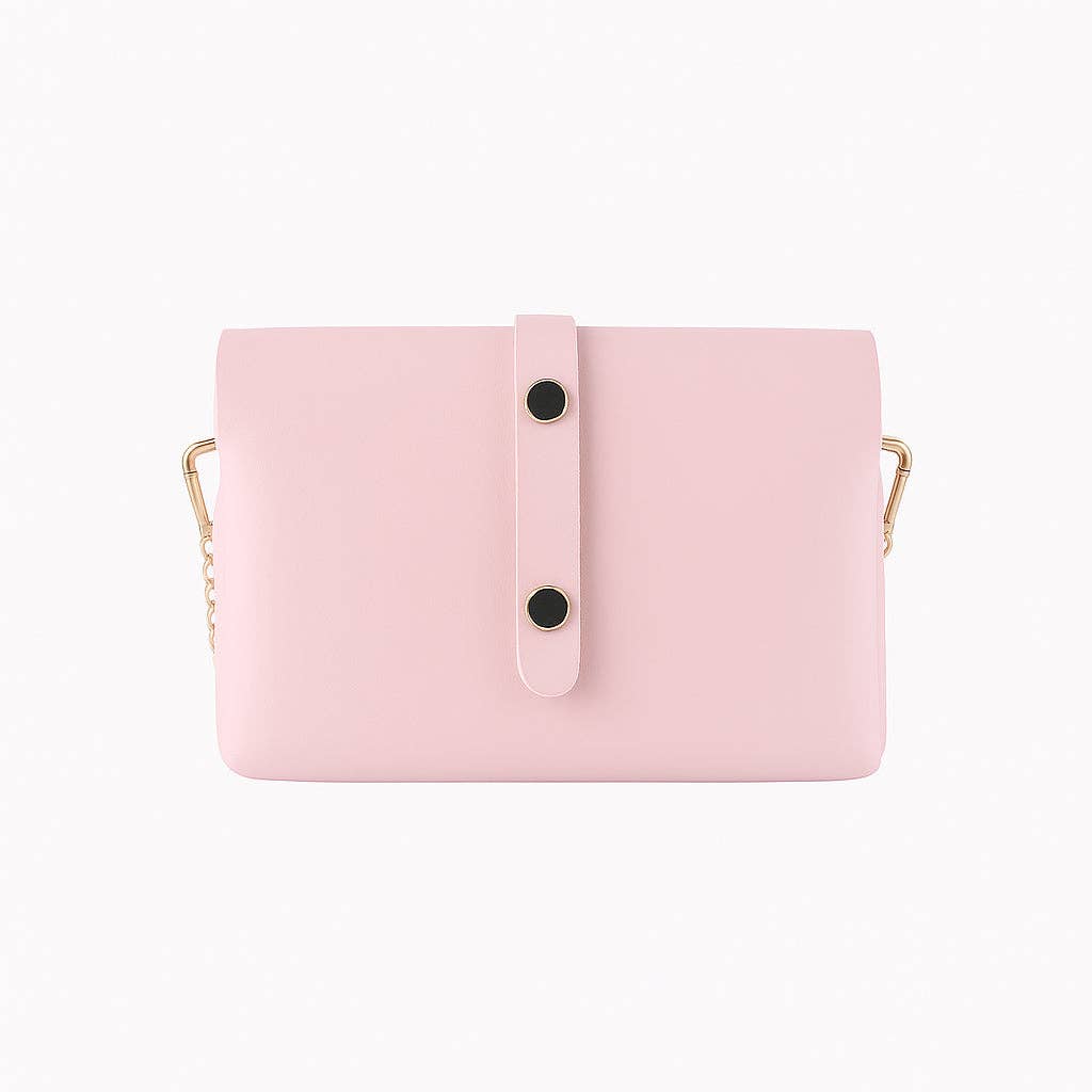 Back view of pink leather mini bag showing vertical strap with two snap buttons